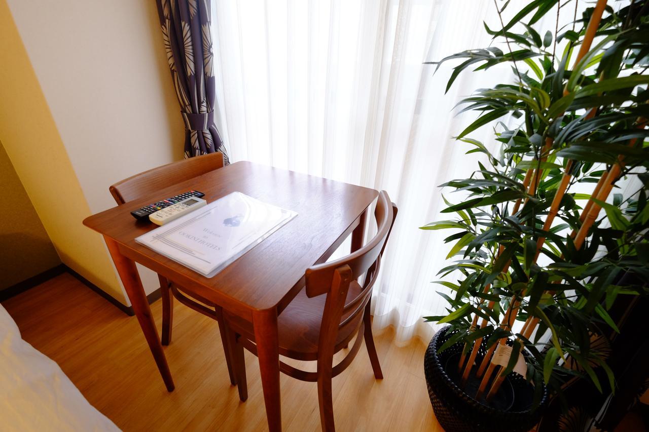 Ookini Hotels Karasuma Gojo Apartment เกียวโต ภายนอก รูปภาพ